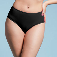 Person wearing black high-waisted underwear on a light blue background