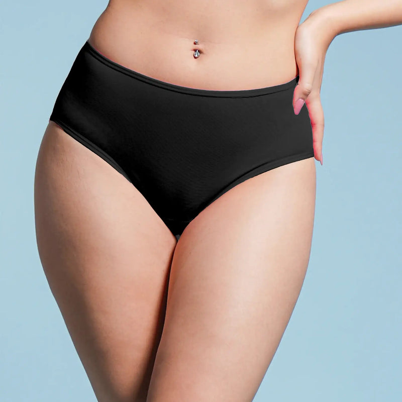 Person wearing black high-waisted underwear on a light blue background