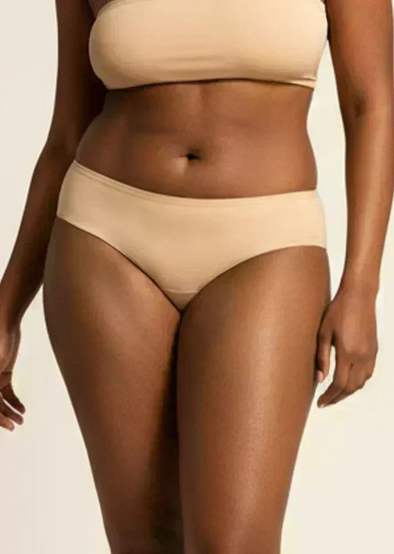 Beige underwear on a neutral background