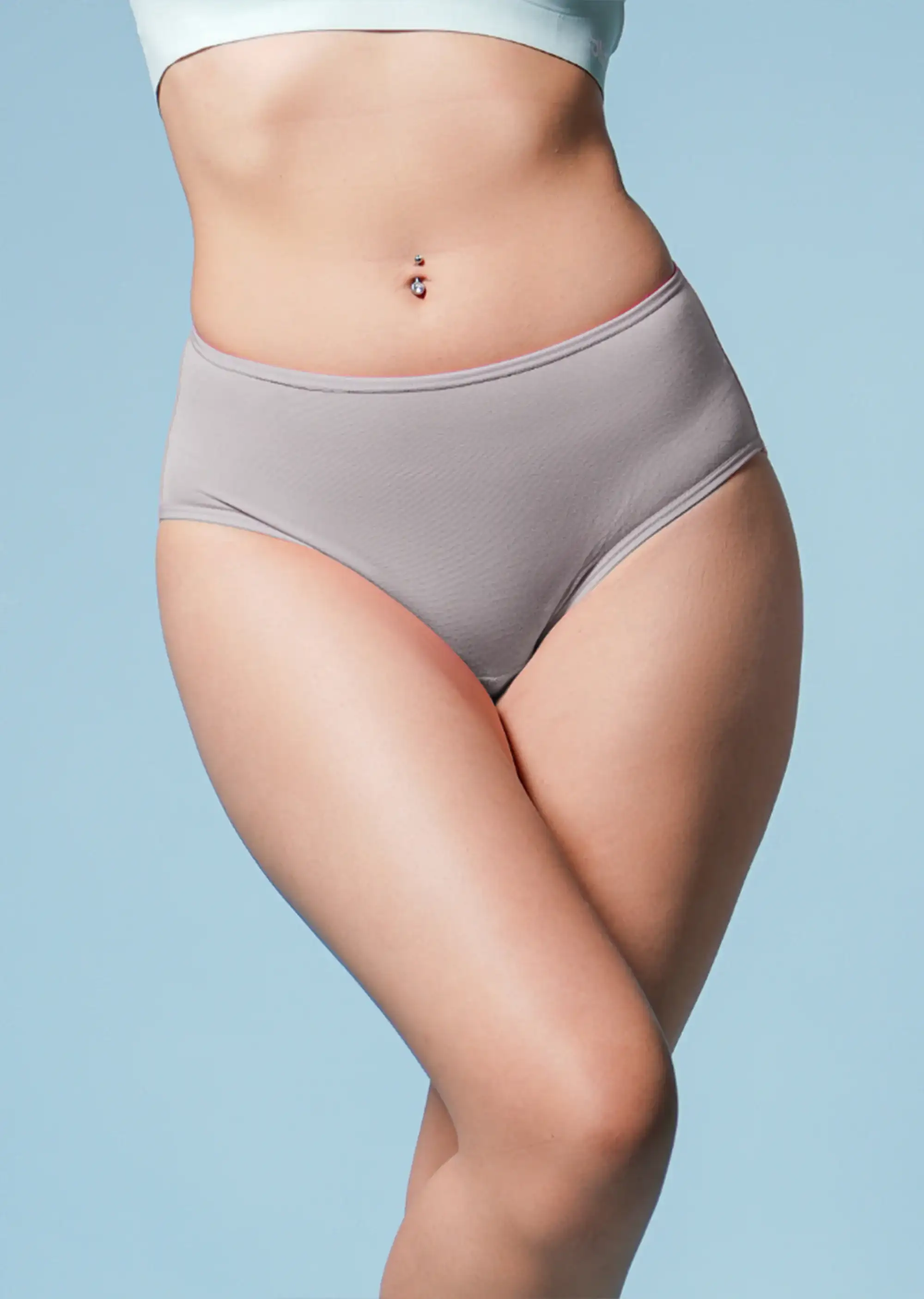 Person wearing a pair of gray underwear against a light blue background