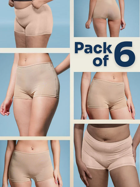Pack of 6 beige boyshorts displayed on a model against a blue background.