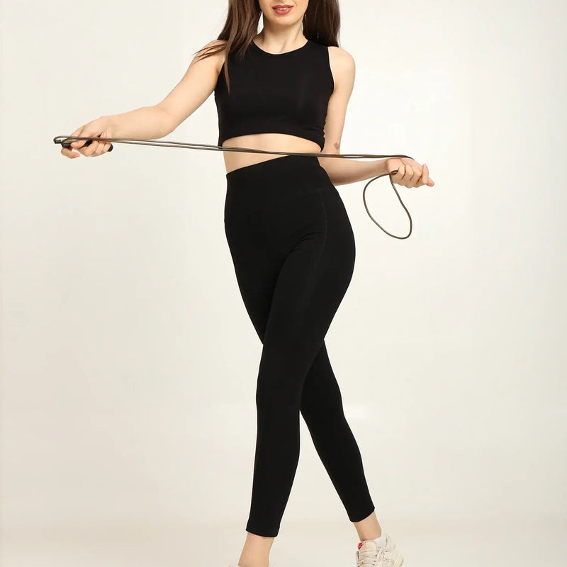 Model wearing women's high-waist bamboo yoga pants with side pocket, showcasing comfort and style.