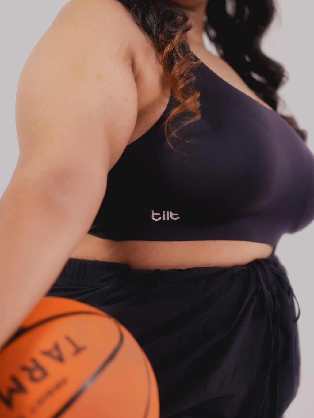 Black racerback comfort bra – Tilt Fursat seamless bra for sports and everyday wear.