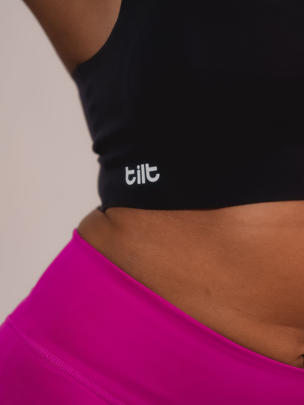 Black Racerback Fursat Bra – Tilt wire-free bra for women, perfect for workouts.