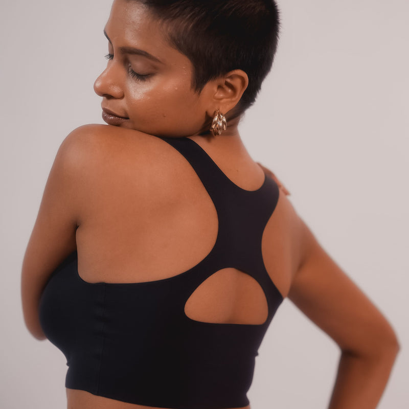 Black comfort bra for women – Tilt Fursat Racerback Bra, seamless and supportive.
