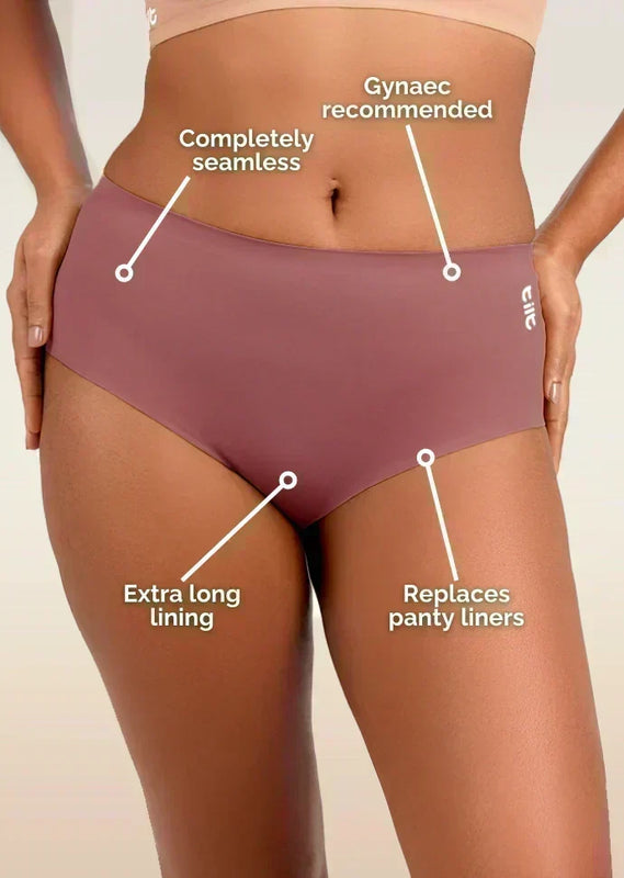 pink women's underwear with text highlighting features on a beige background