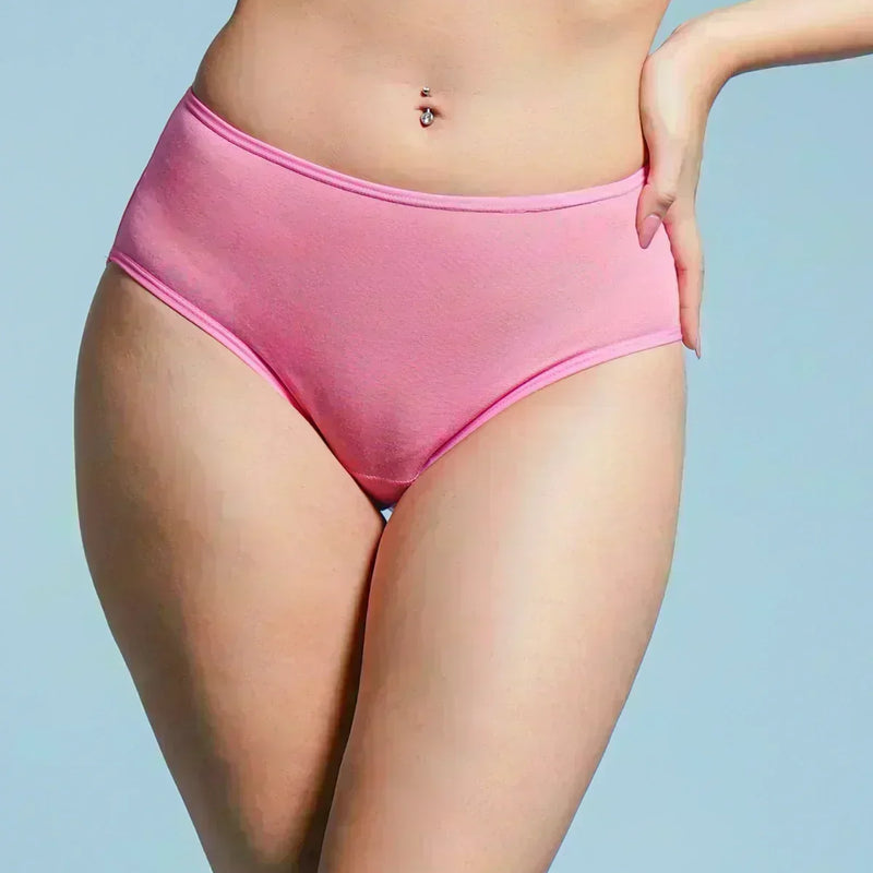 Person wearing pink underwear against a light blue background