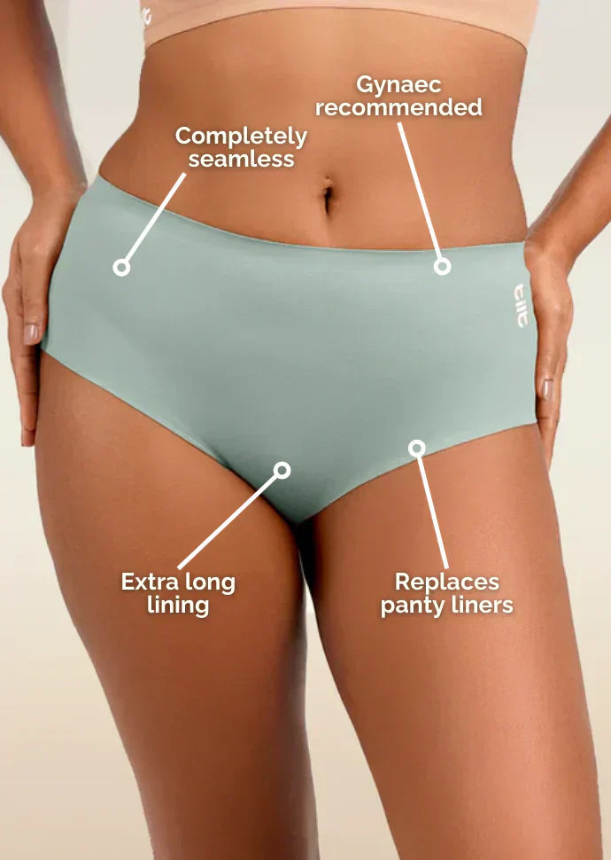 blue underwear with text labels on a beige background