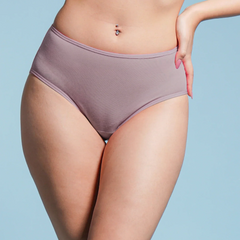 Person wearing a pair of brown underwear against a light blue background