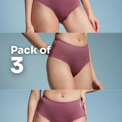 Three-pack of pink underwear on a plain background