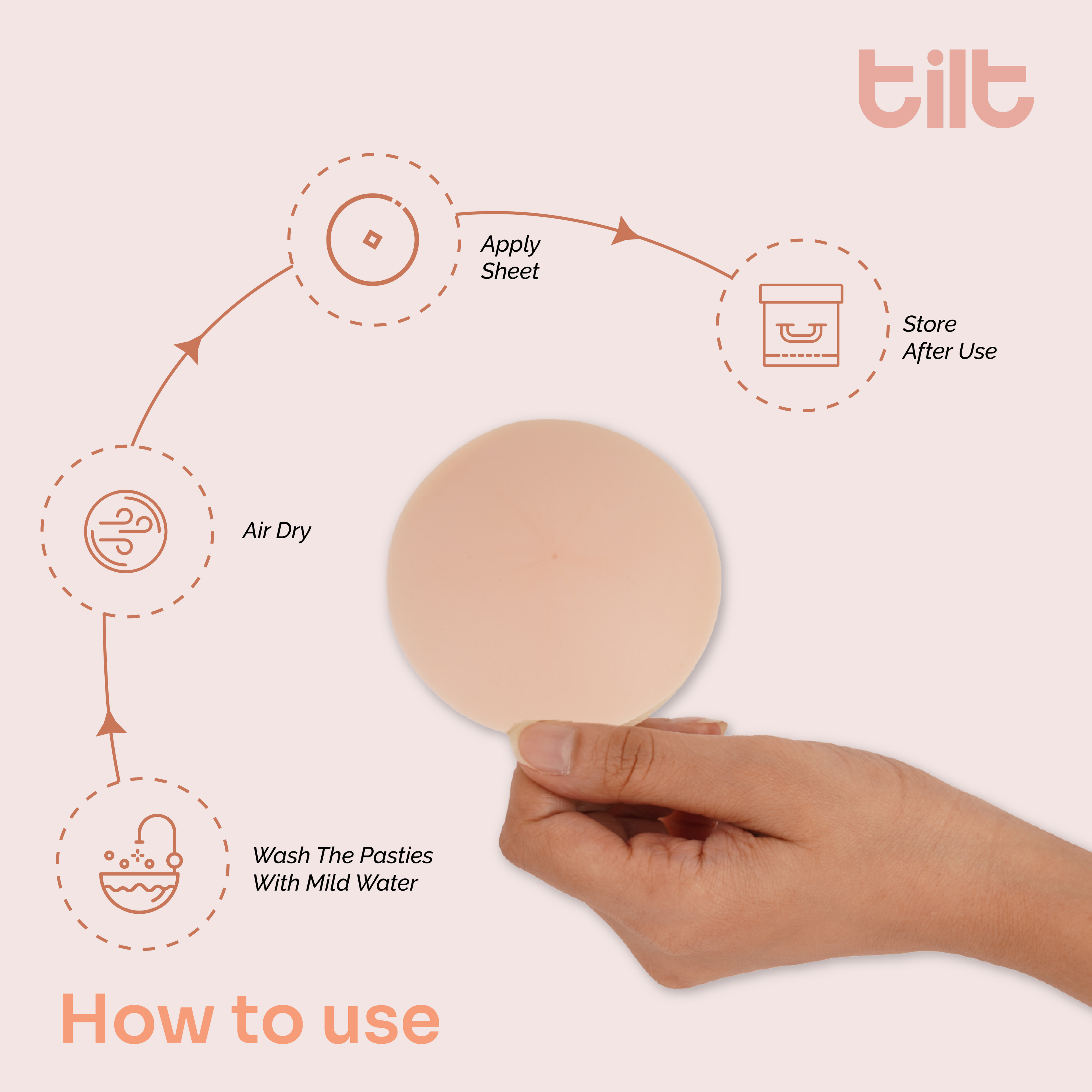 Hand holding a beige circular nipple cover with 'tilt' branding and usage instructions on a light pink background.