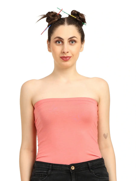 Woman wearing a pink bamboo tube top, showcasing a modern 